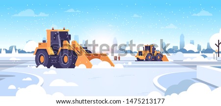 snow plow tractors cleaning city snowy roads winter streets snow removal concept modern cityscape sunshine background flat horizontal Royalty-Free Stock Photo #1475213177