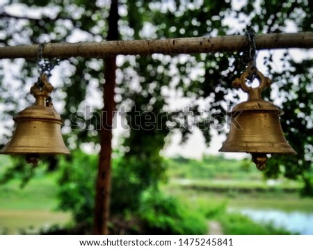 Close up shot of beautiful temple bells at outdoor. Temples bells are being hanged in the outside of the temple in Varanasi near the ghats. Bells from the temple of Lord Shiva.