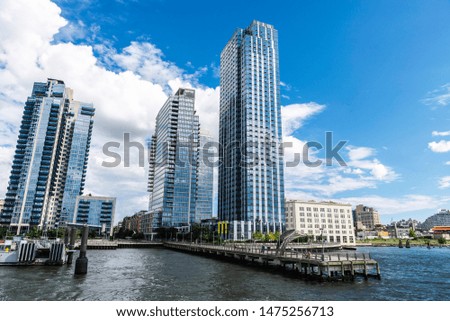 View of the skyline of modern skyscrapers of Long Island City from East River in New York City, USA