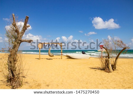 Gold yellow beach and clean blue sky, summer vacation concept photo. It's took at "Kilyos, Burc  Beach. Istanbul"