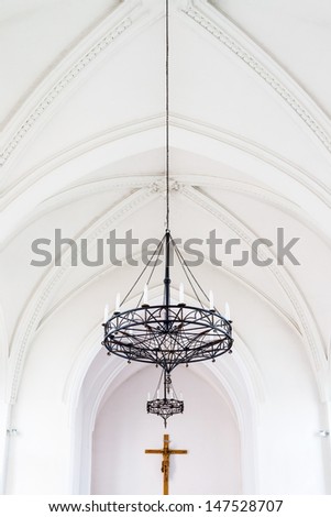 Beautiful metallic chandelier of the catholic Cathedral