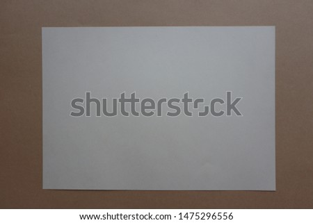 white note paper on a wooden board background