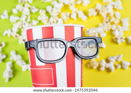 Closeup photo of comic humorous joking proud serious face expression behaving like a small little kid wearing black big specs isolated vivid background