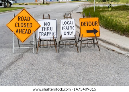 Construction signs on street to direct traffic