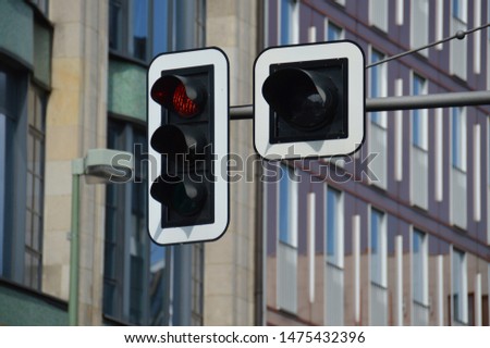 Traffic lights showing red in Berlin, Germany. Concept of no go in projects. This is not permitted or not the right direction or choice.
