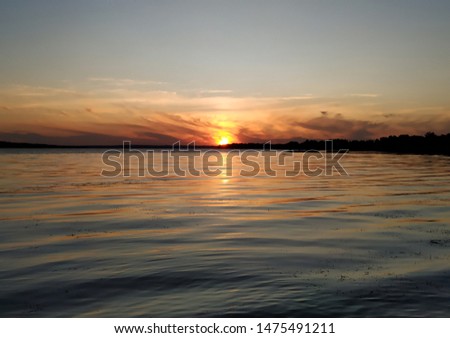 
picture of sunset on the lake