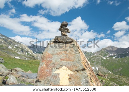 Cairn on a mountain path, La Thuile, Italian Alps, Italy
