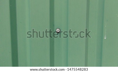 texture and background of green metal sheet fence