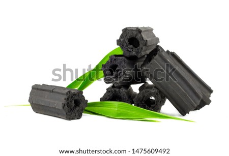 Natural wood charcoal,Bamboo charcoal powder has medicinal properties with traditional charcoal isolated on white background - Image