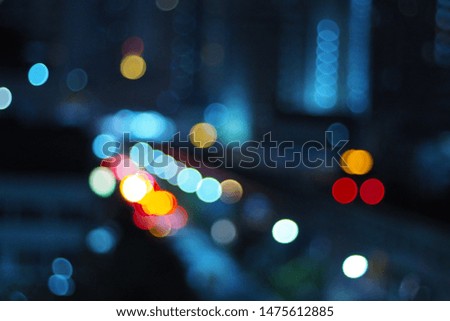 Night blurred bokeh city light and blurred metro station.