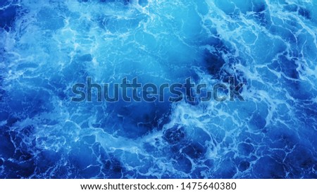  Texture of sea foam in the pacific ocean blue water