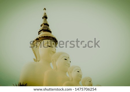 Five Buddha at Wat Pha Sorn Kaew in Khaokho,Petchabun, Thailand. On yellow black screen.