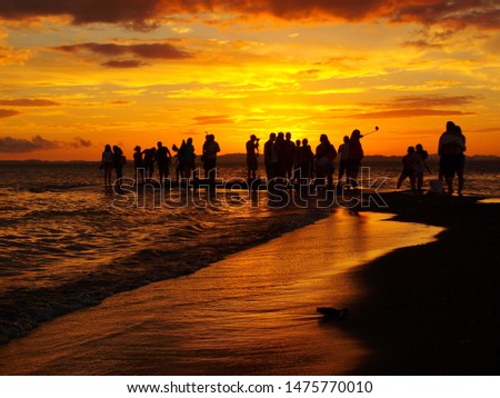 Nicaragua, Isla de Ometepe, People taking Pictures on sandbank