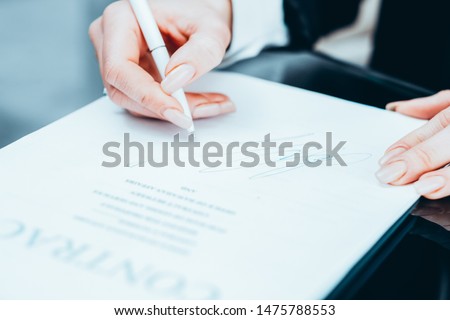 Successful negotiation. Legal professional relationship. Business woman signing contract.