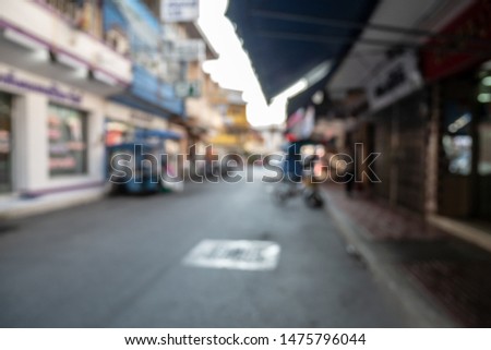 Blurred images as background in the city