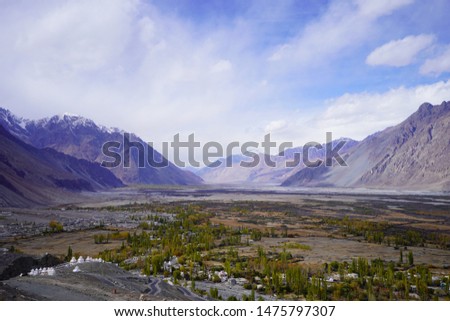 Aerial view landscape and cityscape of Leh Ladakh Village with mountain at Leh Ladakh in Jammu and Kashmir, India while winter season.