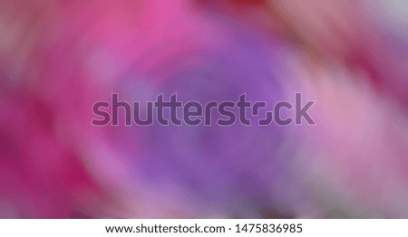 Blurred abstract background of soft pink tones.