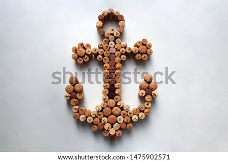 Wine corks anchor silhouette isolated on white background