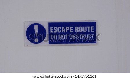 Emergency exit sign on a cruise