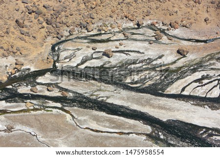 Aerial view of Lake Little Magadi in the Great Rift Valley in Kenya, north of Tanzania's Lake Natron. In the dry season is 80% covered by soda. It is known for its wading birds and flocks of flamingos