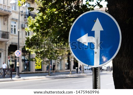 Regulatory signs, proceed in direction indicated by arrow traffic sign