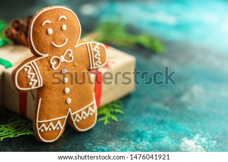 gingerbread. gifts and holiday, happy New Year. festive background. food background. top view Royalty-Free Stock Photo #1476041921