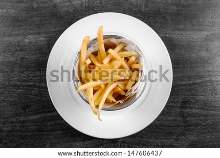 Delicious french fries closeup on the table