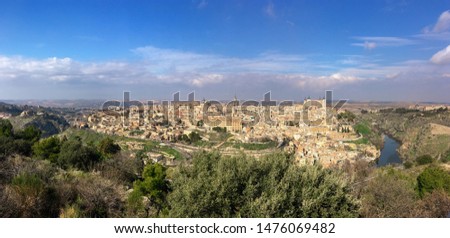Panoramic view of Toledo, city with many medieval buildings in Spain. Photography from the Parador de Toledo hotel on a sunny day.