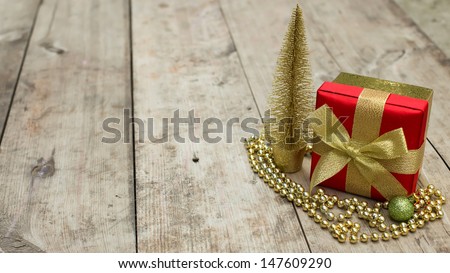 Decorative christmas composition on wooden background. Selective focus.
