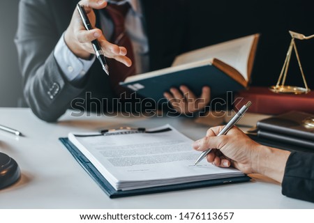 Sign the agreement The Concept of Legal Procedure and Litigation. Royalty-Free Stock Photo #1476113657