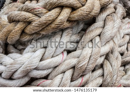 Close up of nautical Mooring ropes. Royalty-Free Stock Photo #1476135179
