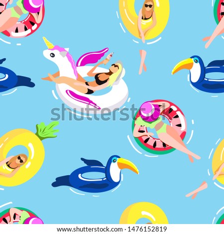 Beach summer vacation. People swim in the sea. Inflatable animals and rescue fruit circle