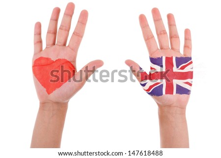 Hands with a painted heart and united kingdom flag, i love uk concept, isolated on white background