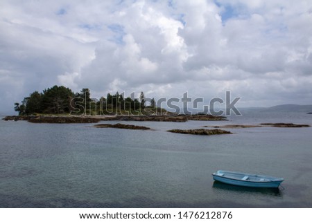 Boats on the water off the coast of Glengarriff West Cork Ireland Royalty-Free Stock Photo #1476212876