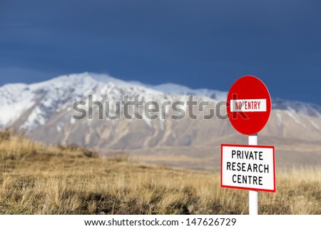 No Entry traffic sign with mountain in the background