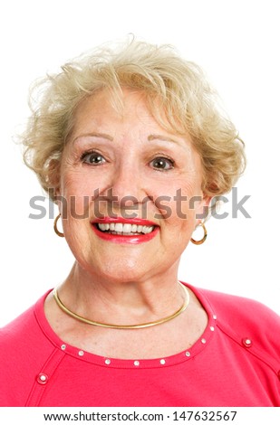 Headshot of a beautiful blond senior lady, isolated on white.  