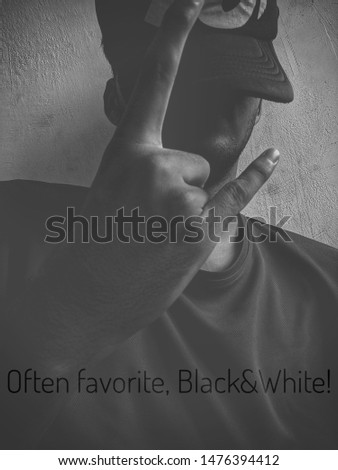 this the black and white edited photo of a model, with caption.