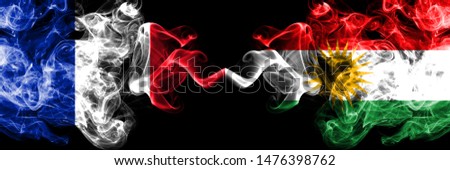 France vs Kurdistan, Kurdish smoky mystic flags placed side by side. Thick colored silky abstract smokes banner of French and Kurdistan, Kurdish