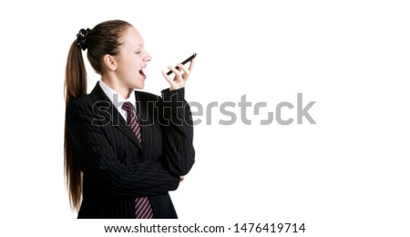 Portrait of a beautiful girl talking on a cell phone, on a white background, isolated