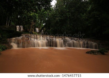 Beautiful waterfall in deep forest . Thansawan Waterfall  in  Doi Phu Nang National Park , Phayao provinces , Thailand