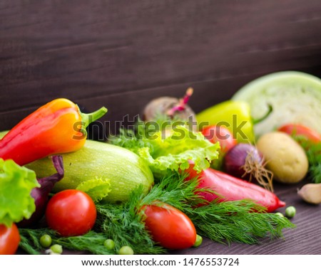 Assorted fresh vegetables. Detox, vegan and clean diet. Fresh vegetables are on the wooden table, green peas in the foreground. Panorama, banner, copy space.