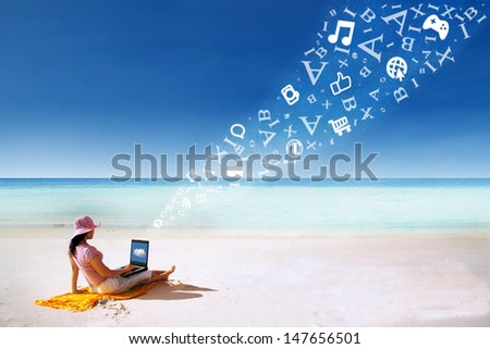 Asian woman with pink hat working on the beach