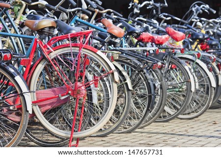 AMSTERDAM-MARCH 21. Bicycle storage. Bicycles outnumber the people in Amsterdam: 760,000 citizens and nearly a million bikes. There are also twice as many bikes then cars. Amsterdam, March 21, 2013. Royalty-Free Stock Photo #147657731