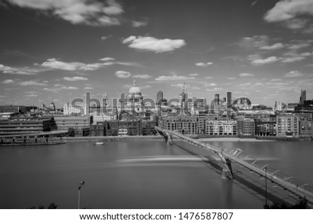 Long exposure shot in black and white showing cityscape of London with St. Pauls Cathedral and river Thames, United Kingdom