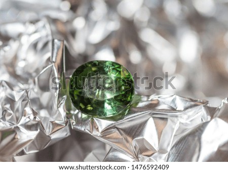 Small green sapphire in close-up