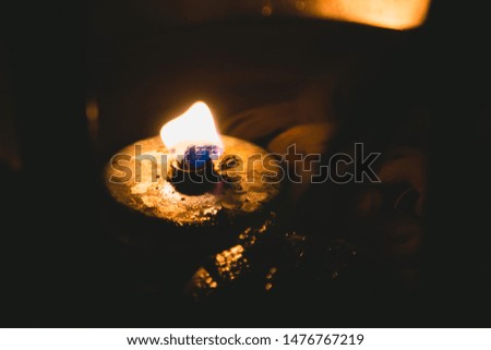 Candlelight in a black background
