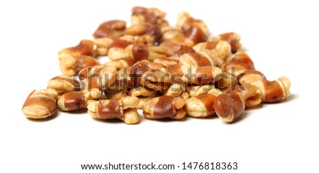 Roasted salted broad beans whith shell on white background stock photo