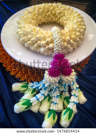 Thai Flower Garland with jasmine & roses as sign of respect (flower garland for religious ceremonies Thailand tradition example philanthropy, marriage, Songkran festival, Mother's day in Thailand