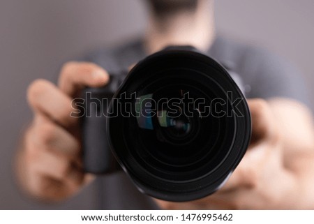 digital camera modern in hand