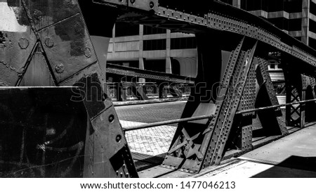 Black and white picture of old vintage steel bridge in Chicago, Illinois
